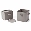 Foldable fabric storage cube in neutral gray with handles